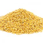 Black mustard seeds isolated on white background