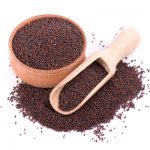 Black mustard seeds isolated on white background